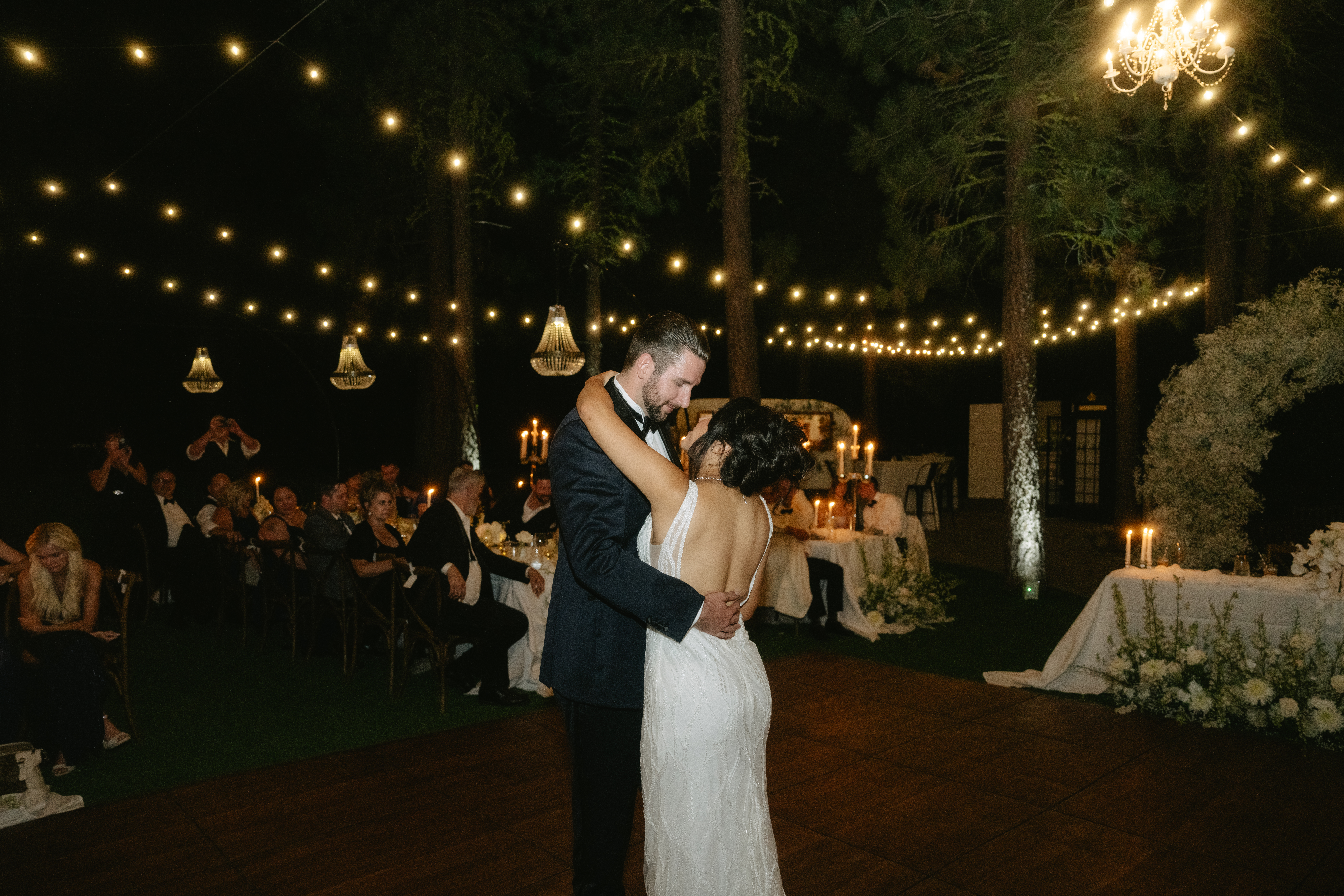 Bride and groom sharing a first dance on the dance floor