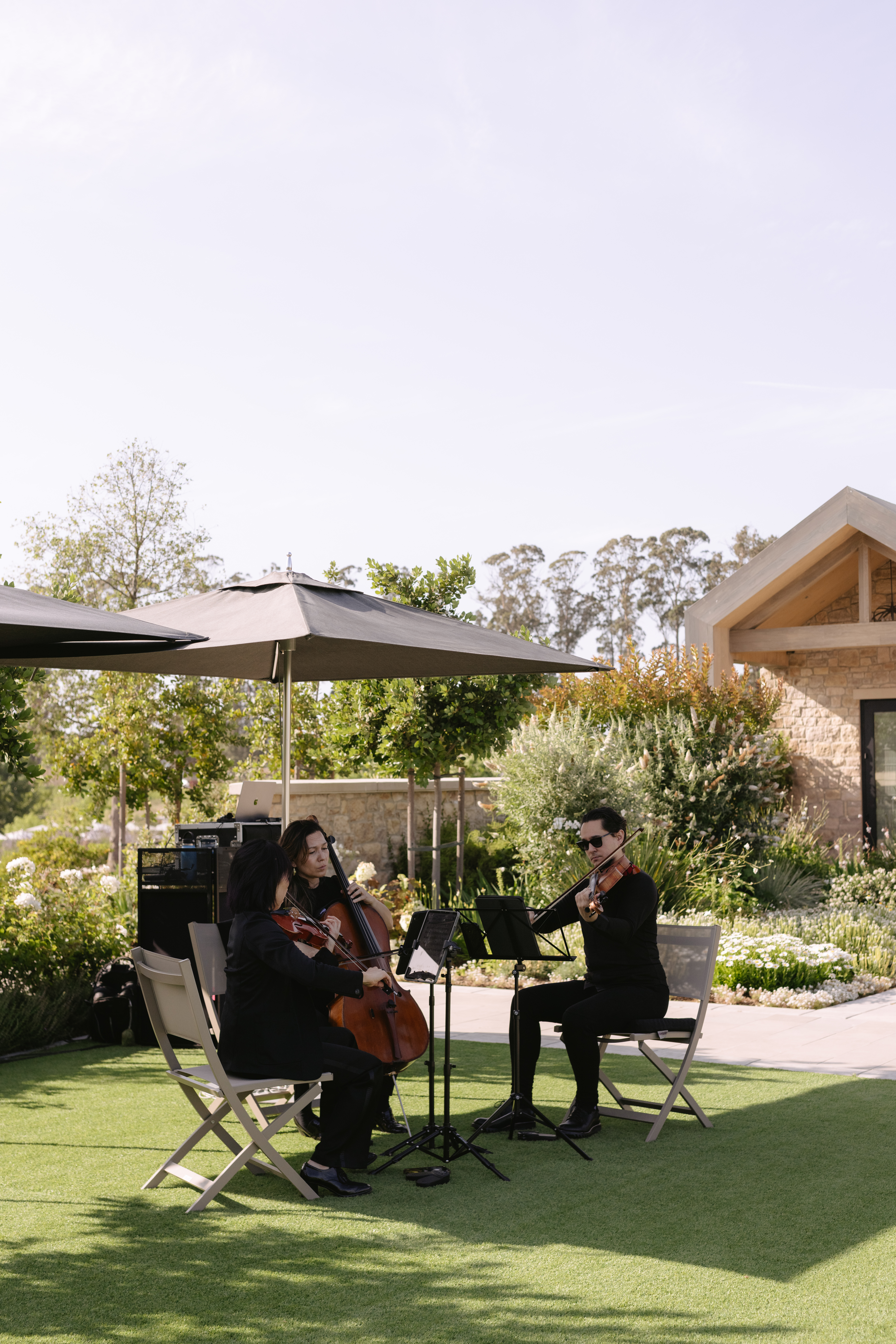 Live musicians playing music at a wedding ceremony