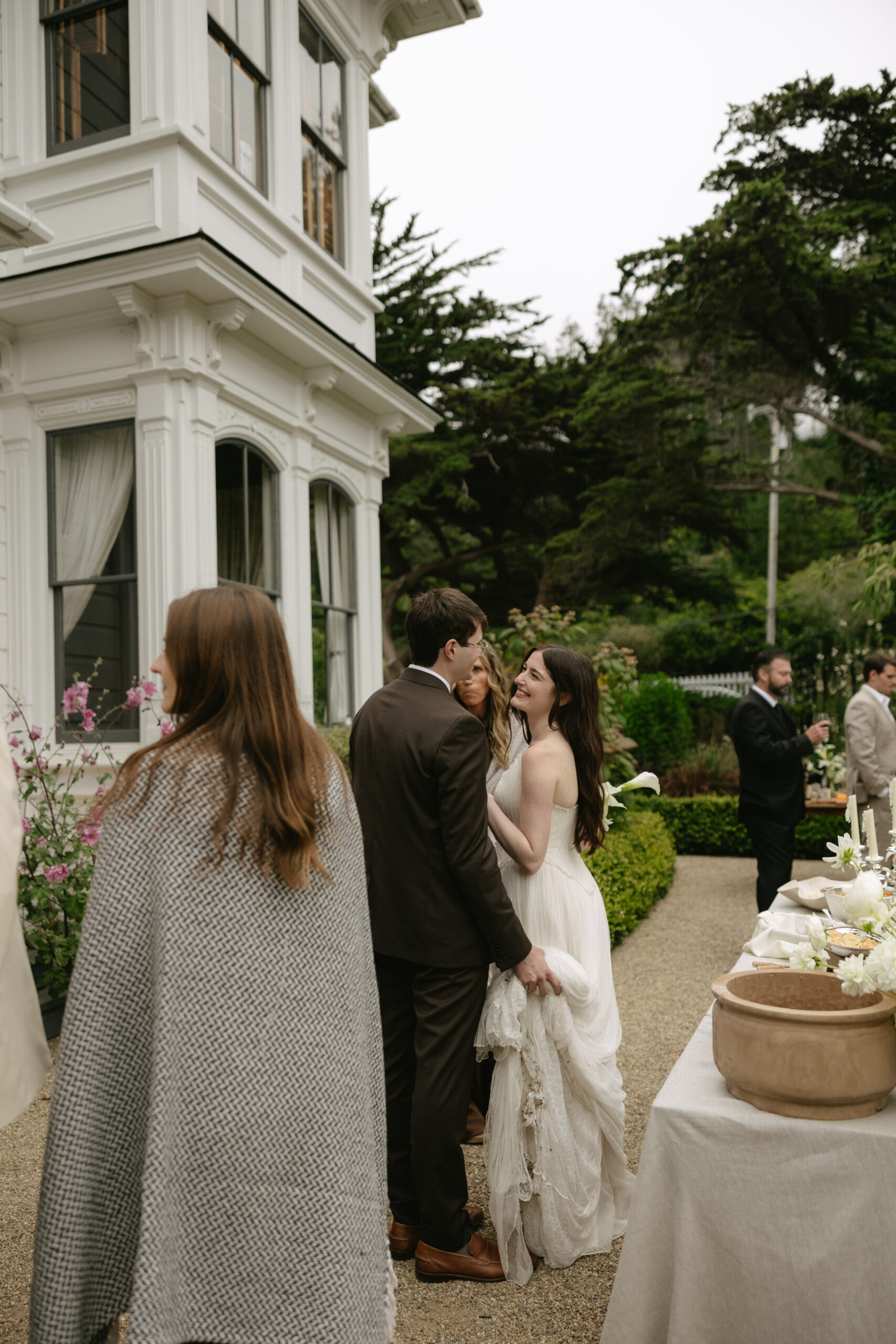Bride and groom smiling at each other during wedding reception