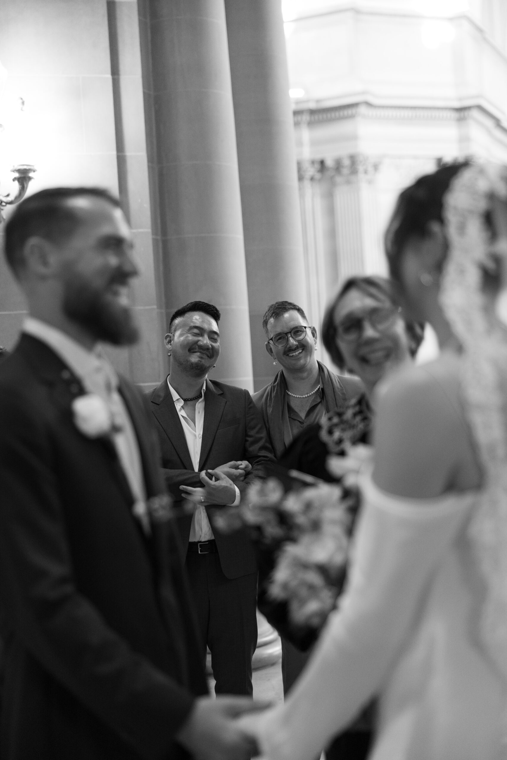 Guests watching a ceremony in a san Francisco City Hall wedding