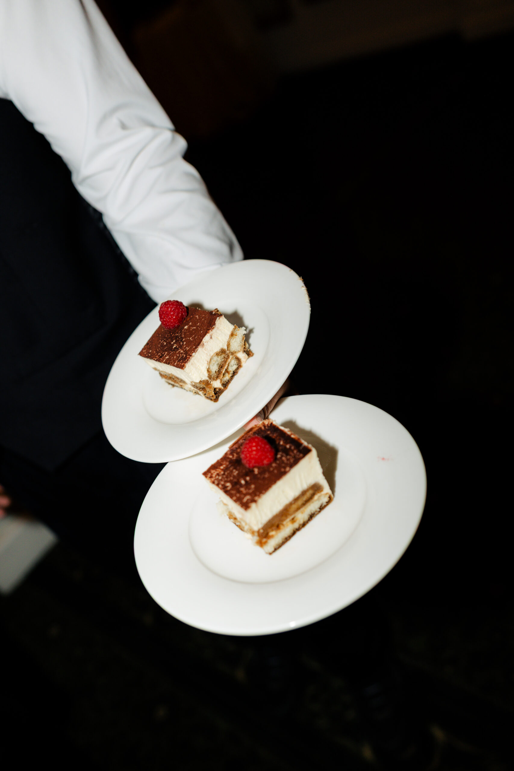 Tiramisu being served as wedding cake 