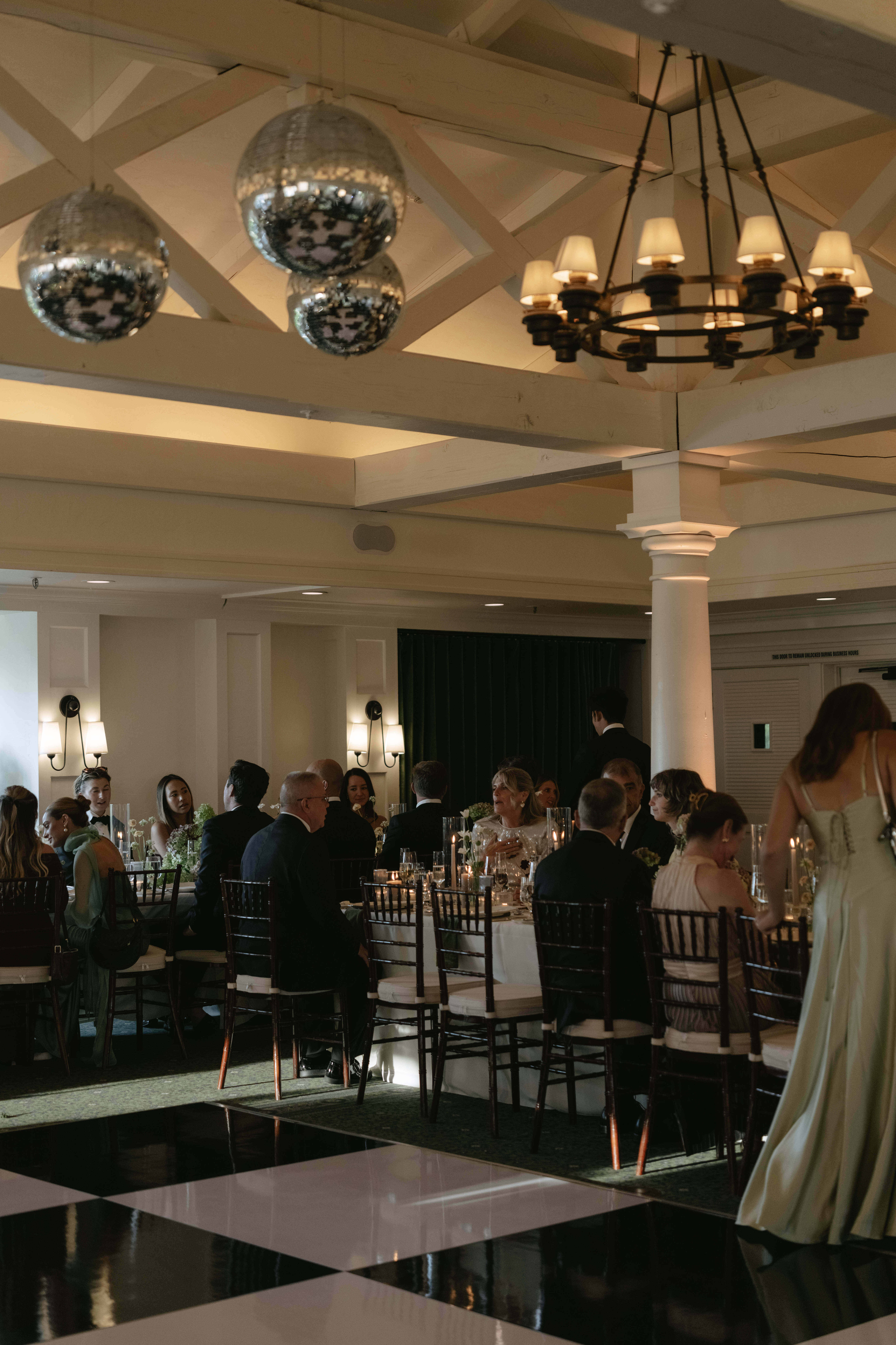 A candid photo of the wedding dance floor at an indoor wedding reception