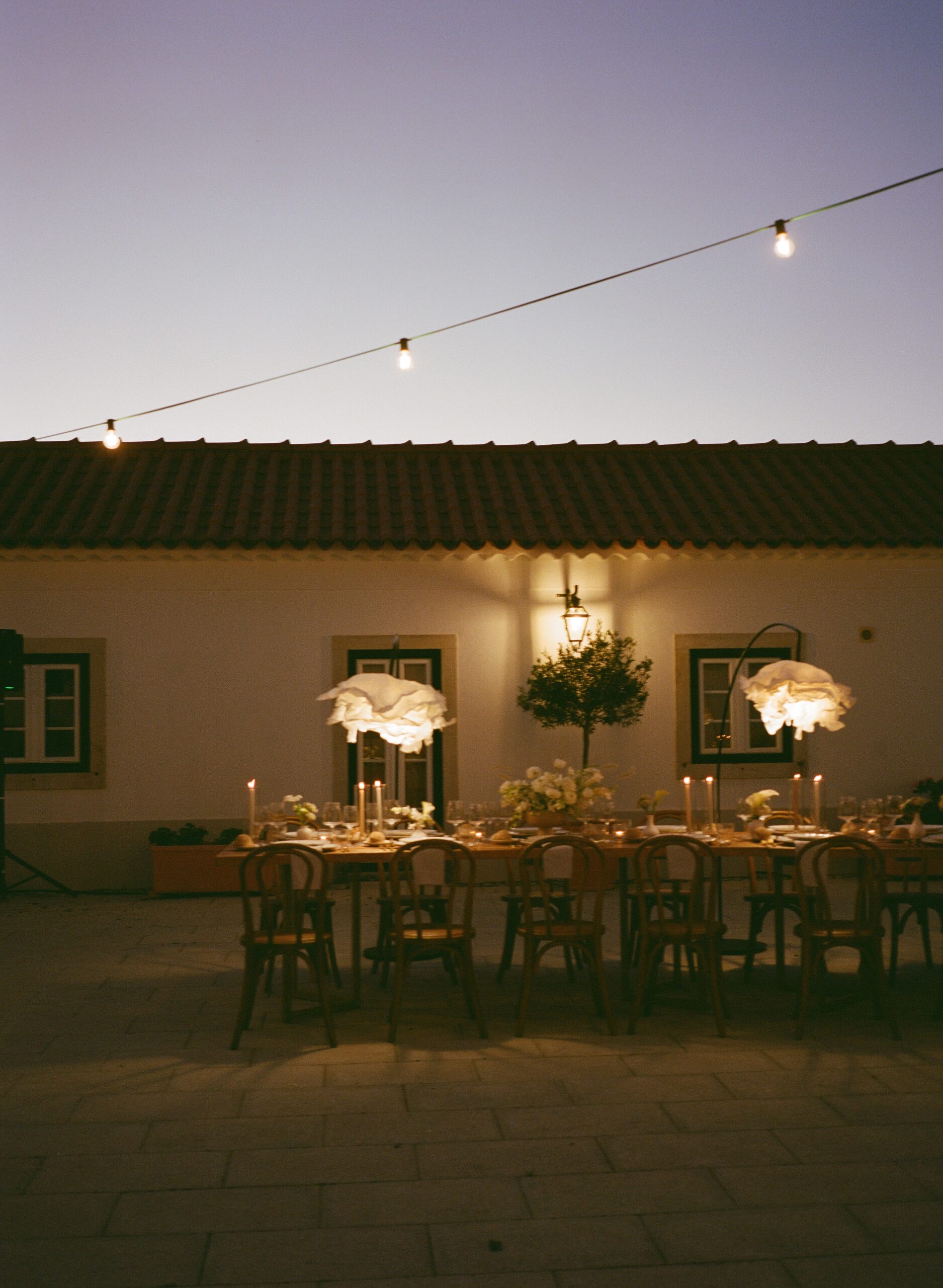 Dimly lit wedding reception table
