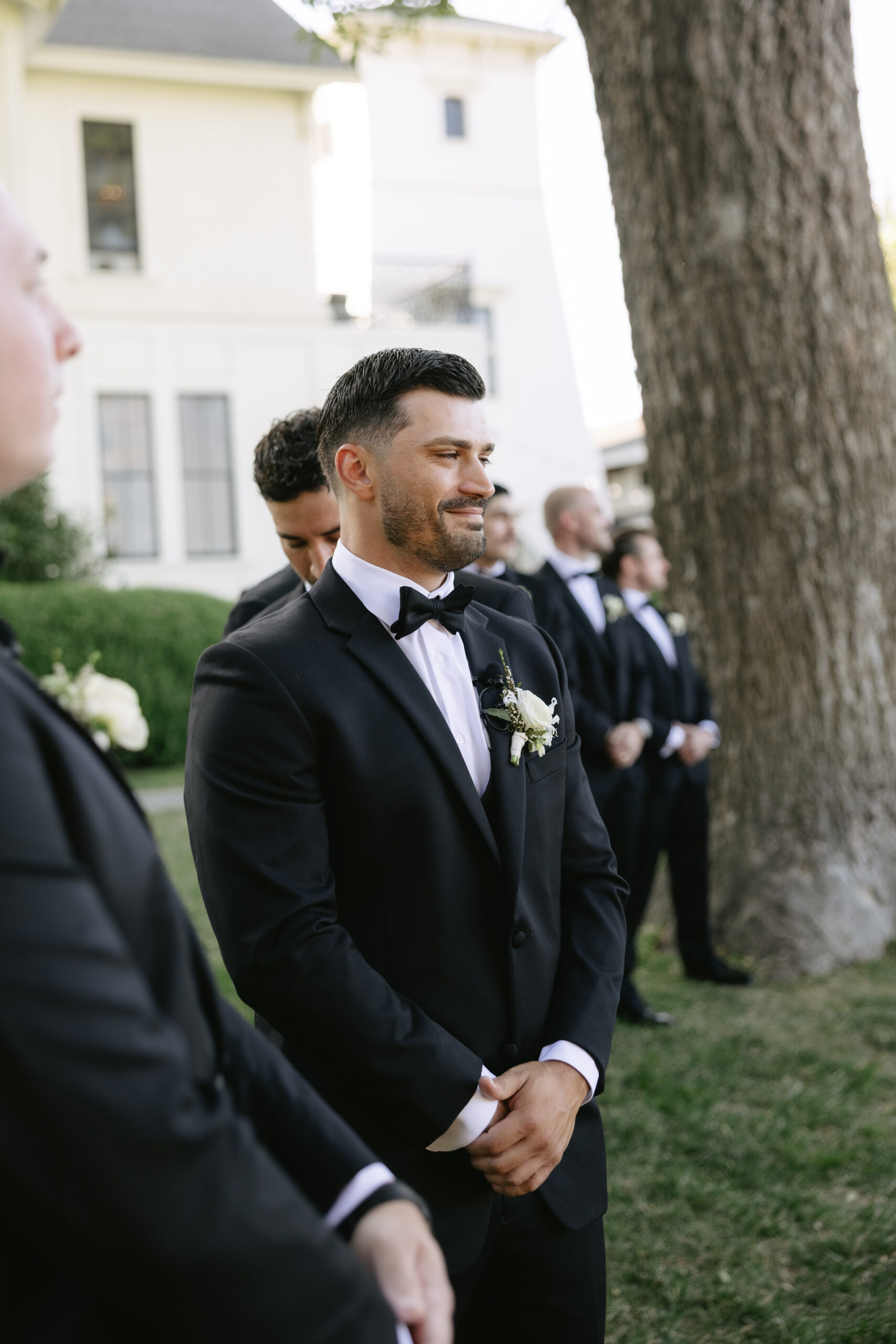 A groom's reaction to a bride walking down the aisle