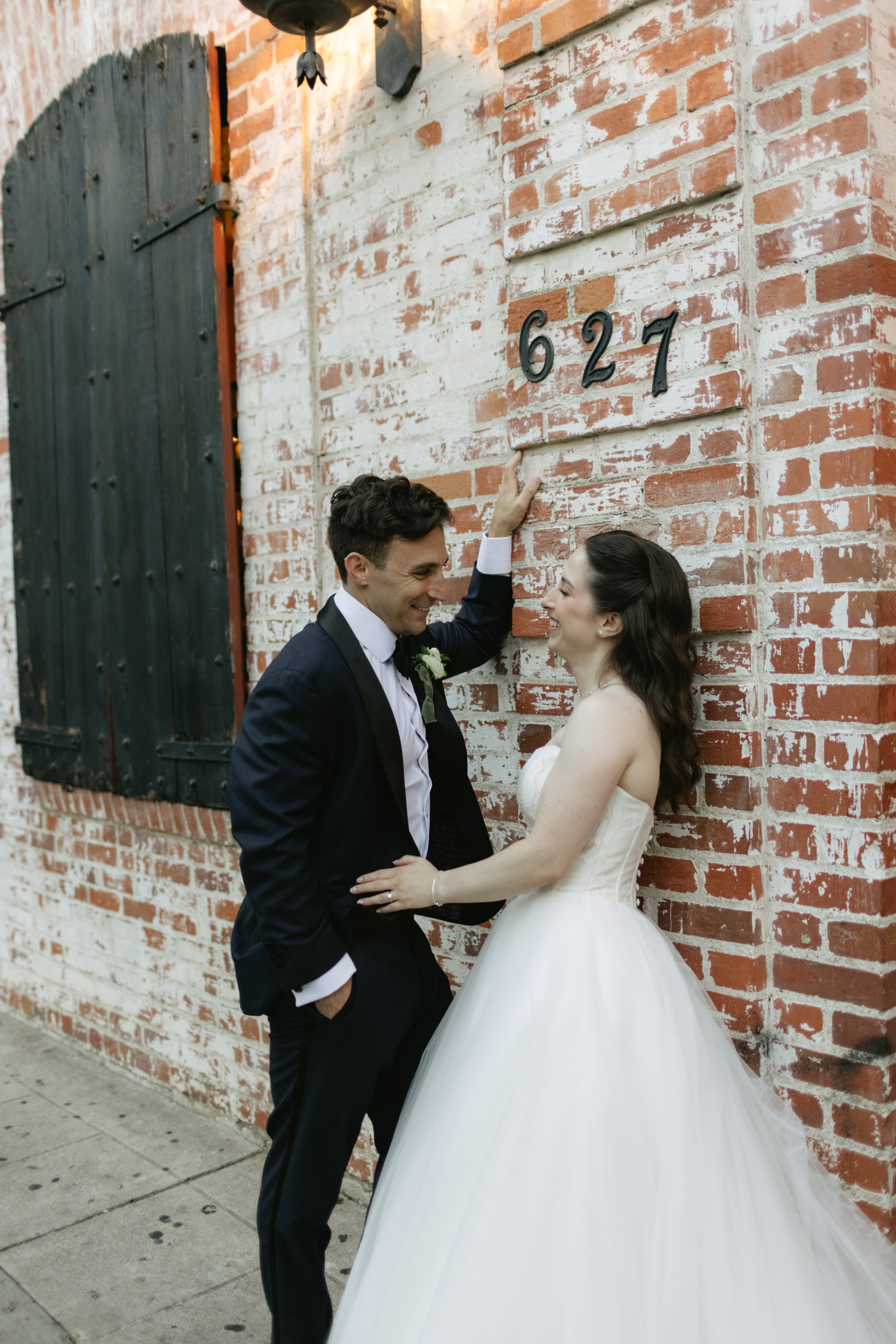A couple laughing during wedding photos
