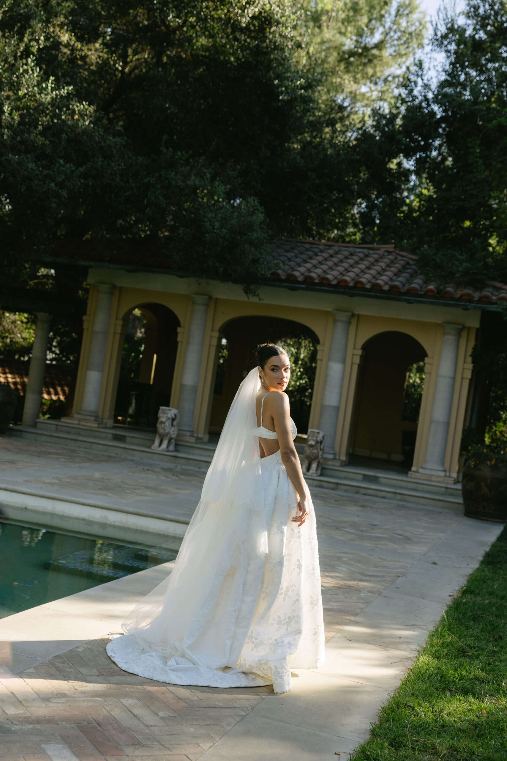 A bride walking through Pasadena wedding venue, etienne estate