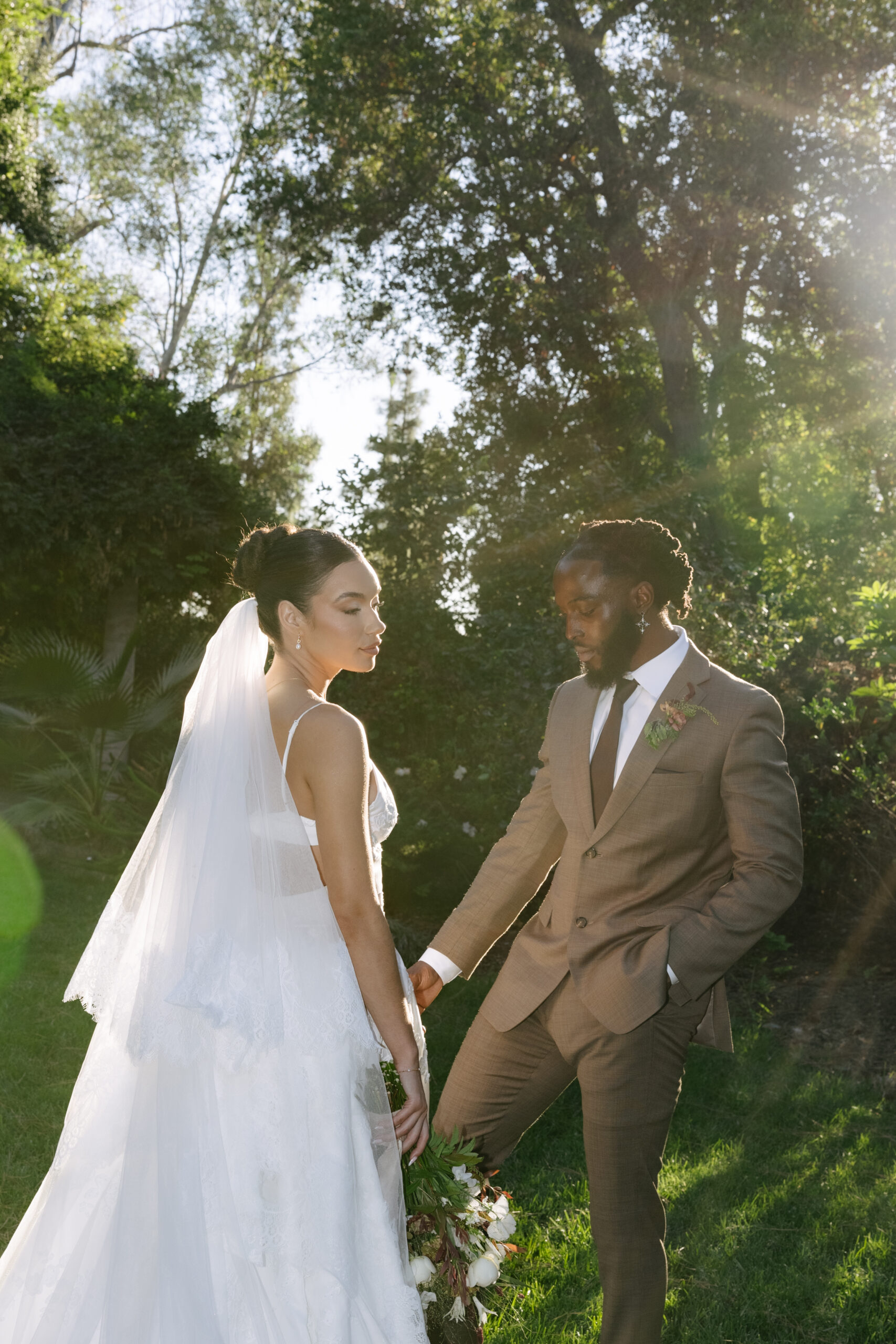 A bride and groom model posing for a styled shoot at etienne estate