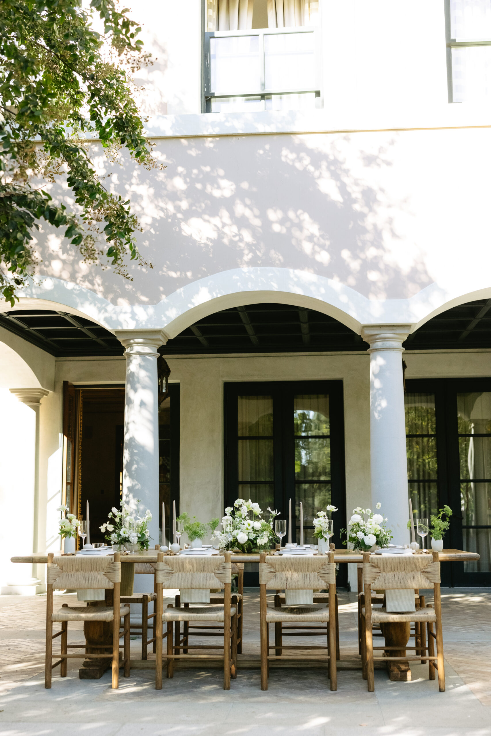 A wedding reception table setup at Etienne Estate