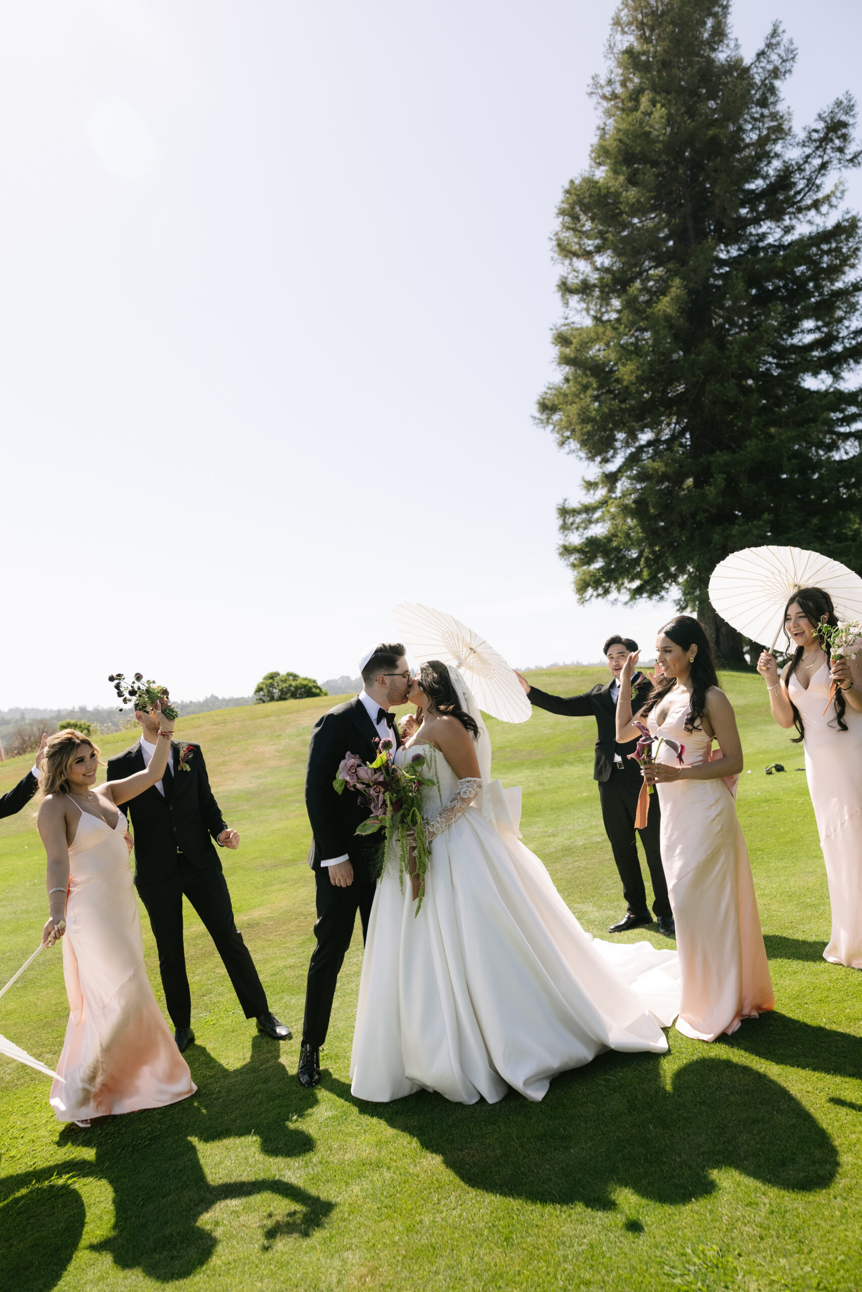 A wedding party posing for wedding photos