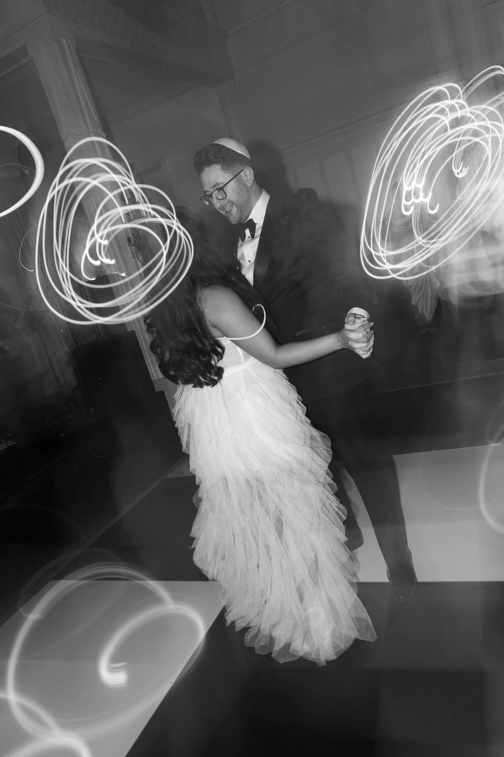 A bride and groom dancing at their Peninsula golf and country club wedding reception