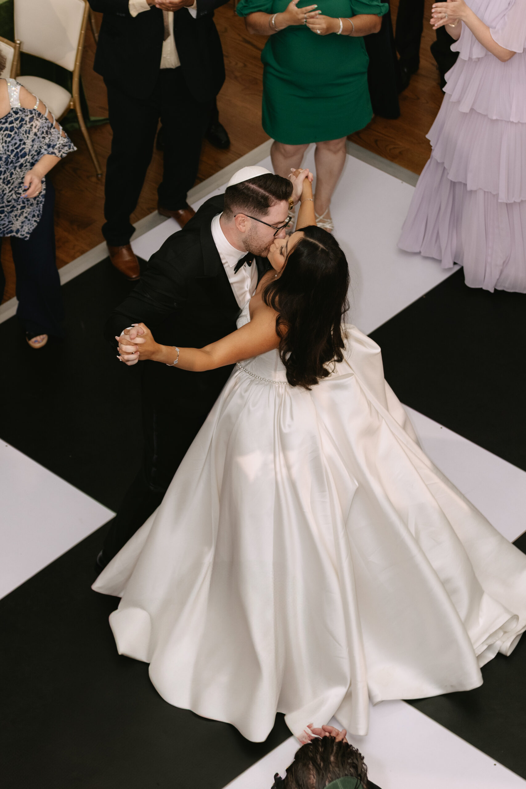 A couple on the dance floor at their wedding reception at Peninsula Golf and COuntry Club